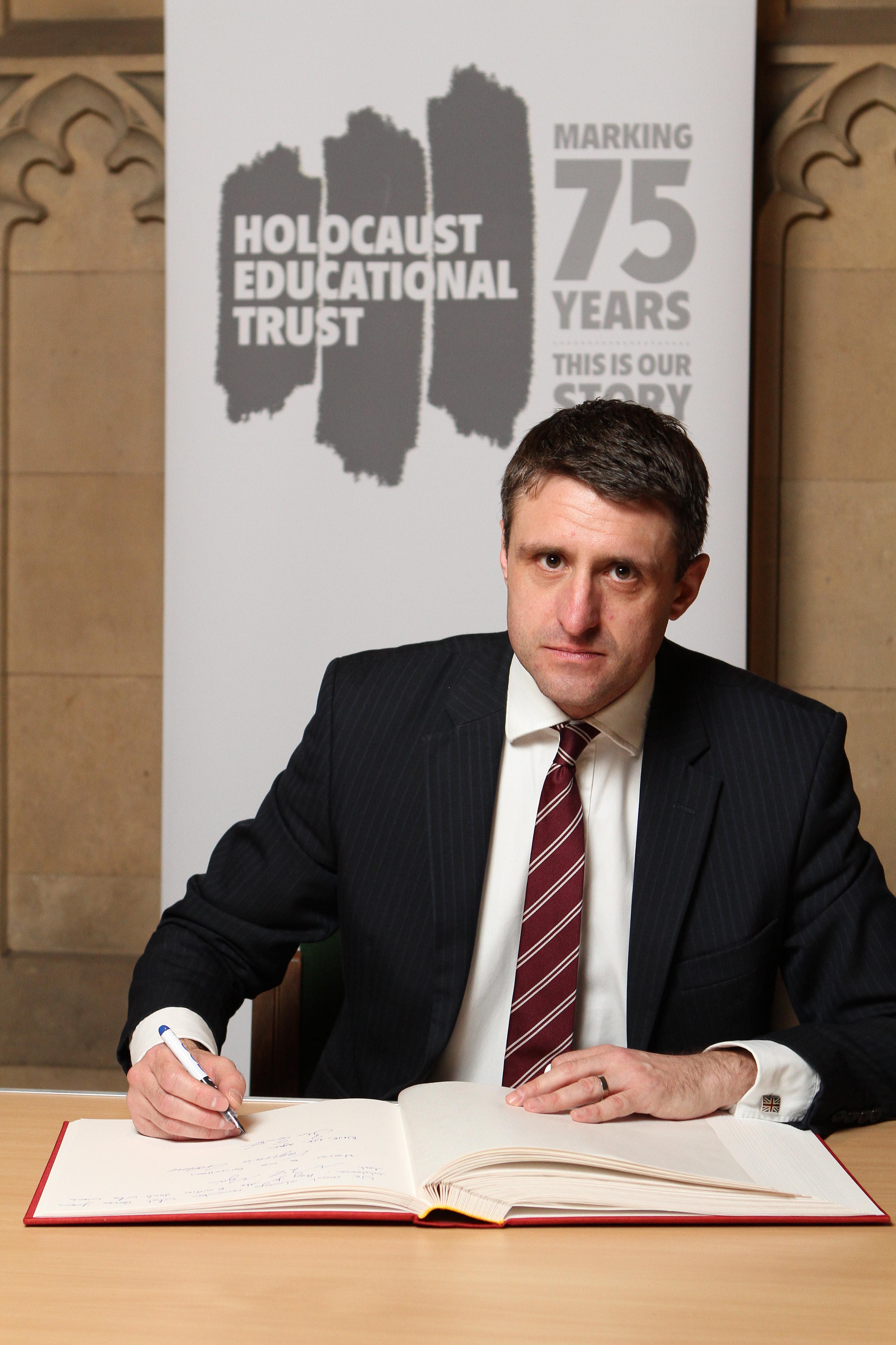 Ben Signs Holocaust Educational Trust's Book of Commitment