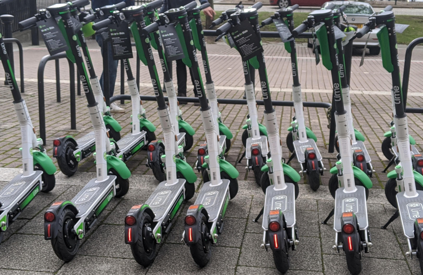 a row of e-scooters parked in Milton Keynes