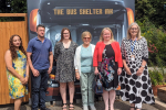 Ben Everitt MP with Minister Felicity Buchan (second from right) and members of the Bus Shelter MK team