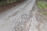 a badly damaged Milton Keynes road