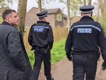 Ben on a patrol in Heelands with police officers