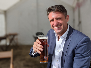 Ben Everitt MP with a beer